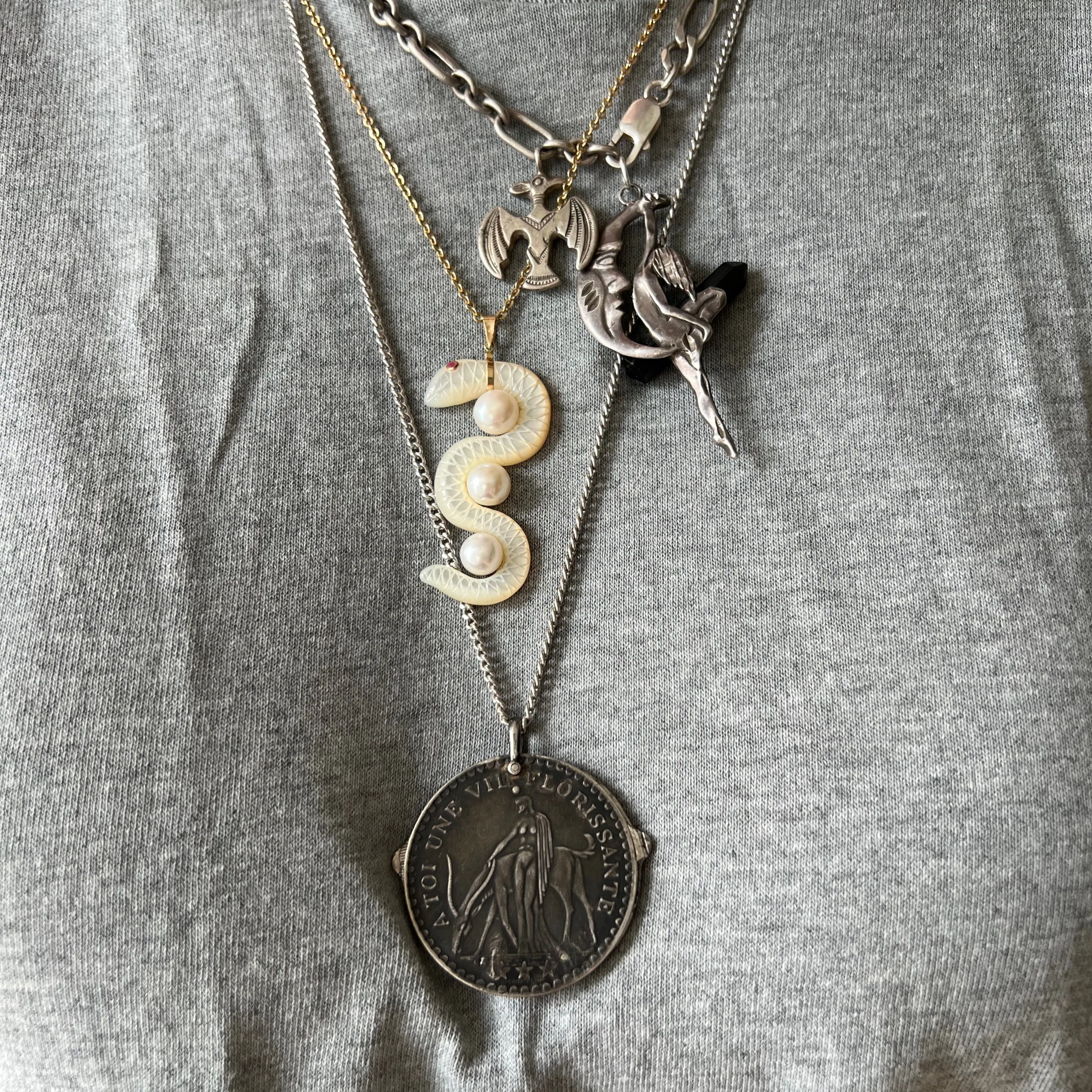 V I N T A G E // moon moon / sterling silver and crystal point man and the moon and figure / a pendant